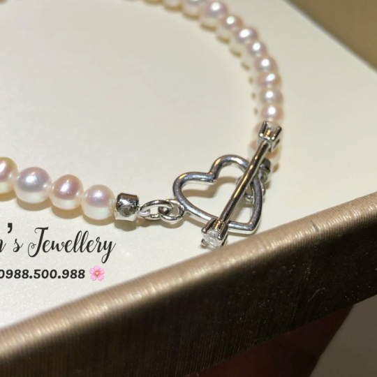  Lắc tay Ngọc trai size 4 li oval khoai tây , bóng đẹp. Khoá đồng cao cấp