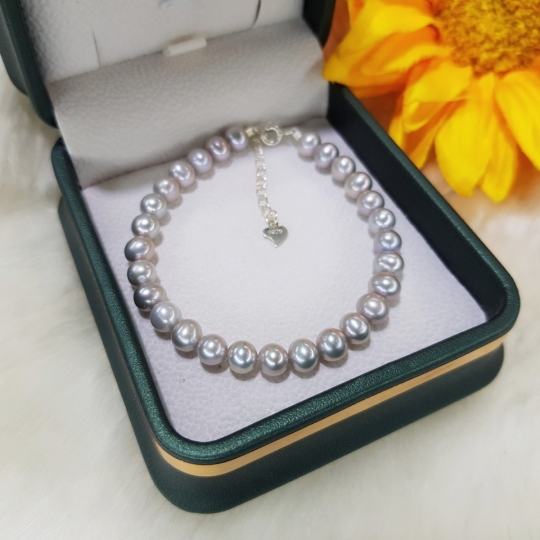 Lắc tay ngọc trai xám oval size 5.5 - 6 li
