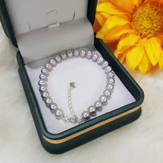 Lắc tay ngọc trai xám oval size 5.5 - 6 li