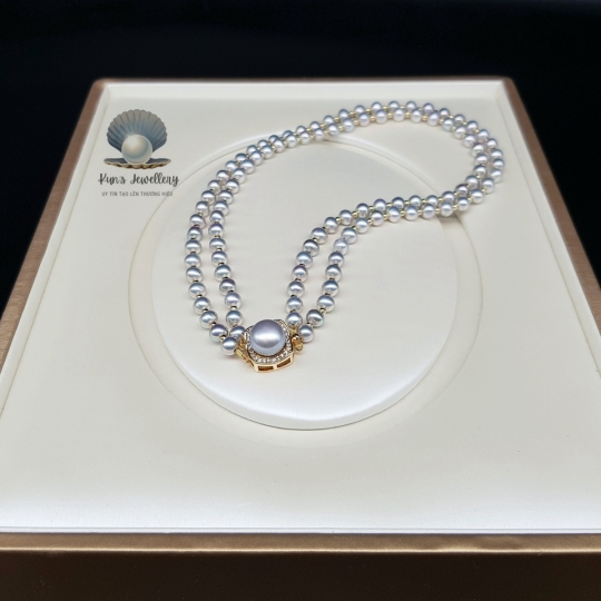  Chuỗi ngọc trai oval xám 5.5 li mix khoá và charm đồng cao cấp